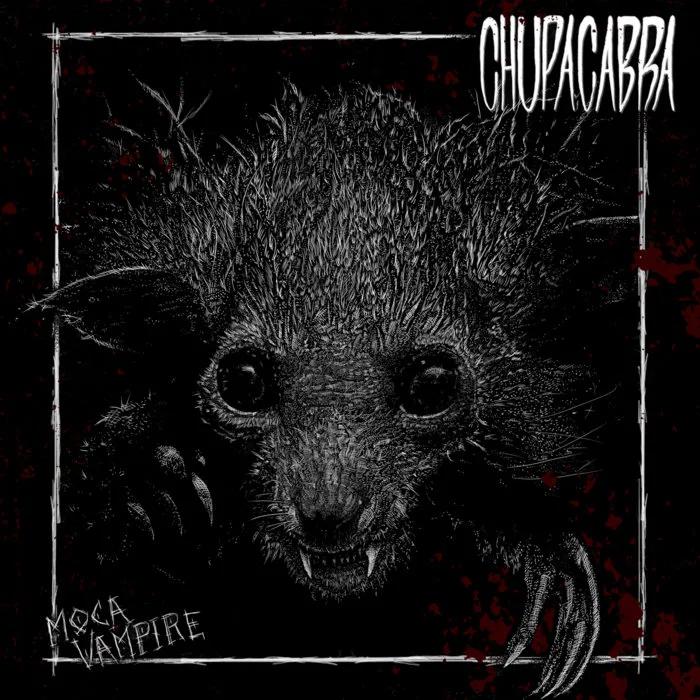 A horror-themed illustration of a chupacabra creature with large round eyes, sharp fangs, and clawed hands emerging from darkness. The creature has shaggy fur and bat-like ears. White gothic text at the top reads "CHUPACABBA" and smaller text in the bottom left says "MOCA VAMPIRE." Red blood-splatter effects surround the image within a rough white border, giving it an album cover or poster aesthetic.